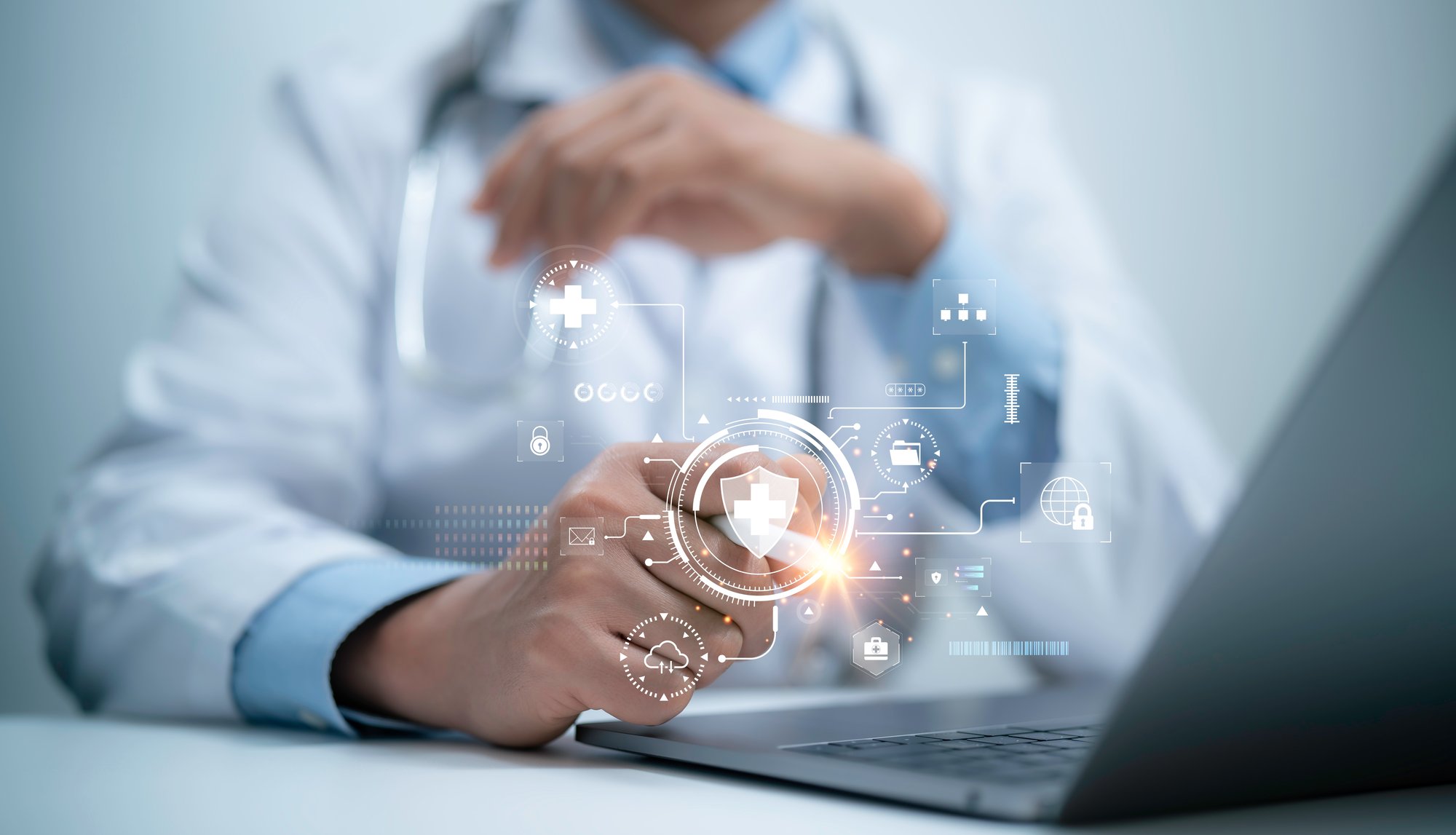 Healthcare professional using secure cloud technology, representing an AWS Level 1 Managed Security Service Provider ensuring data protection and compliance